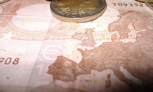 Euro coins and note