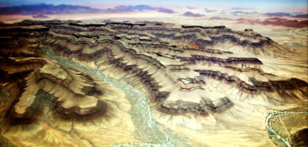 aerial shot of the fish river canyon in namibian desert