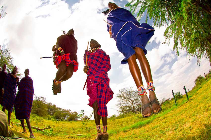 Masai tribes-people perform a traditional dance in Kenya.