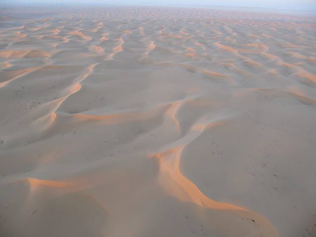 View of the Arabian Desert taken from a hot air balloon near Dubai, UAE.