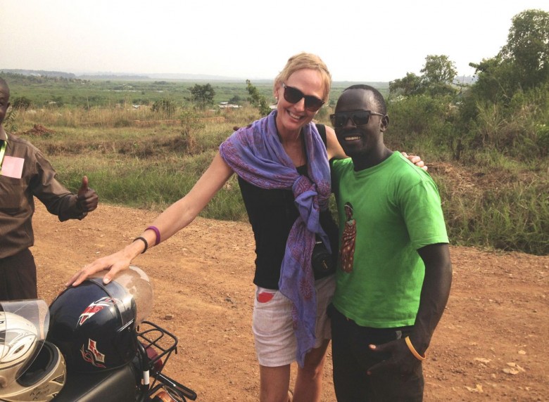 Dawn and her guide Joseph from Walter's Boda Boda Tours at the King's Lake, Kampala.