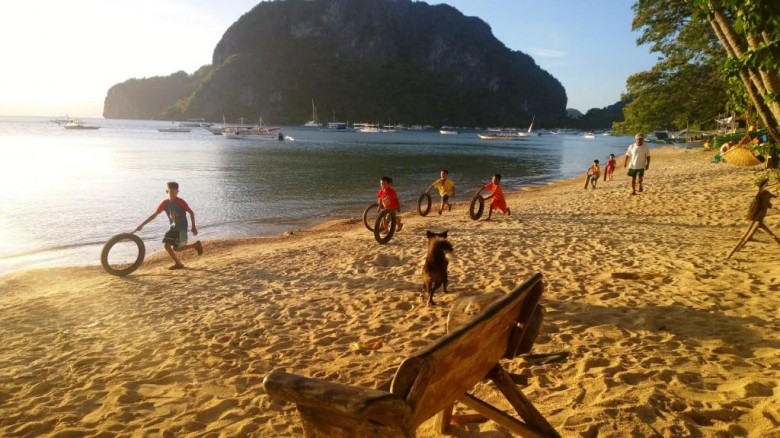Kids on a beach in El Nido, Philippines