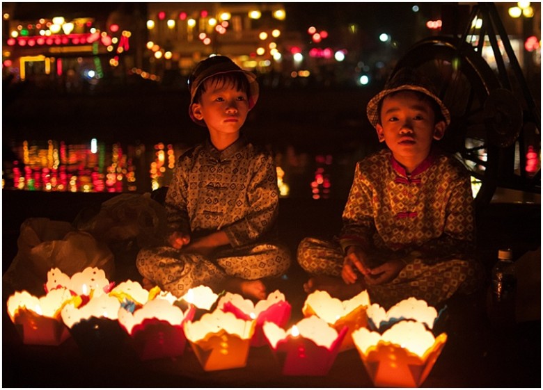 Children by candle light Roxy Hutton Vietnam