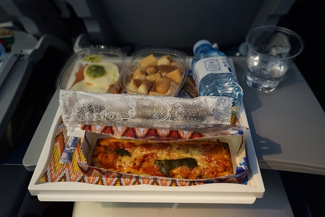 KLM Airlines serves pizza to passengers in Economy Class.
