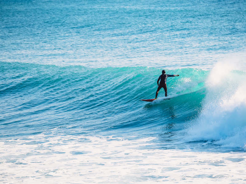  Surfer bij Nahoon Reef