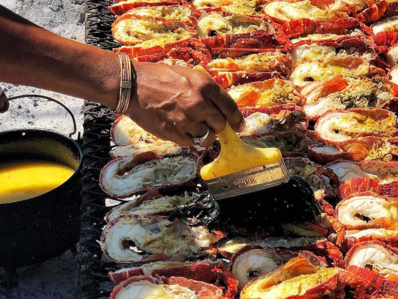 Fish being prepared at Die Strandloper best places to visit in Cape Town