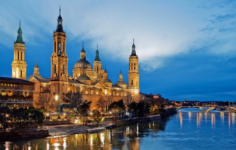 Our Lady of Pilar in Zaragoza lit at dusk