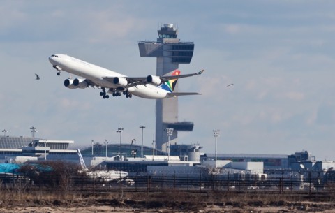 SAA A340 climbs after take off from JFK airport in New York