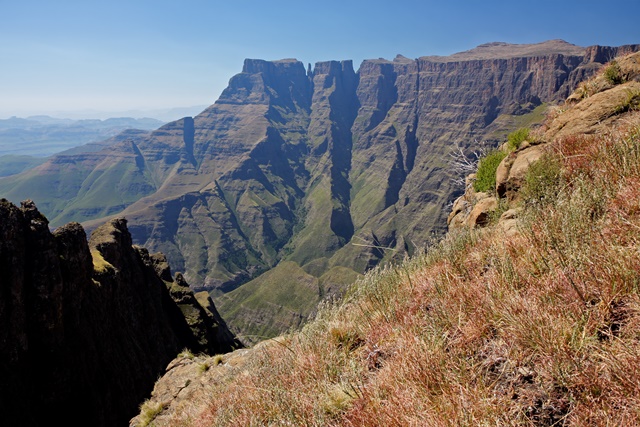 The beautiful Drakensberg mountains cascade into the green hills of Natal