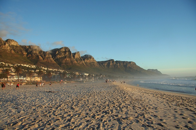 Get down to Camps Bay early in the morning for a beach picnic.