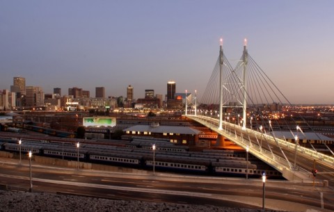Johannesburg skyline with Nelson Mandela Bridge in the foreground.