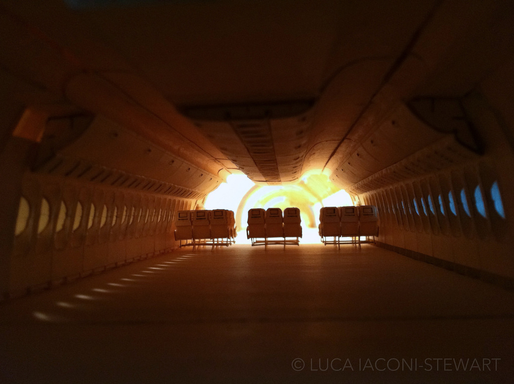 Installing the ceiling and overhead compartments in the Economy Class cabin.