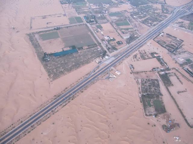  A camel farm seen from a balloon safari in the desert outside Dubai.