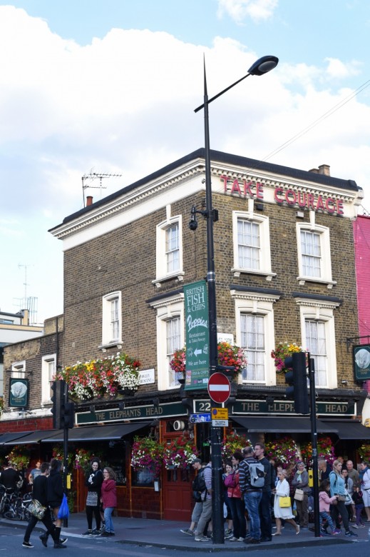 Summertime in London. The streets bustle with foreigners and locals alike, enjoying the sunshine and the pretty flowers embellishing window ledges. 