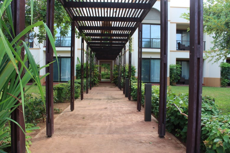 The pergola leading up to the rooms.