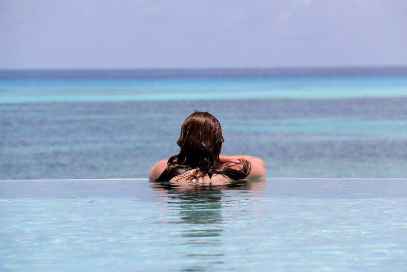 person in maldives pool