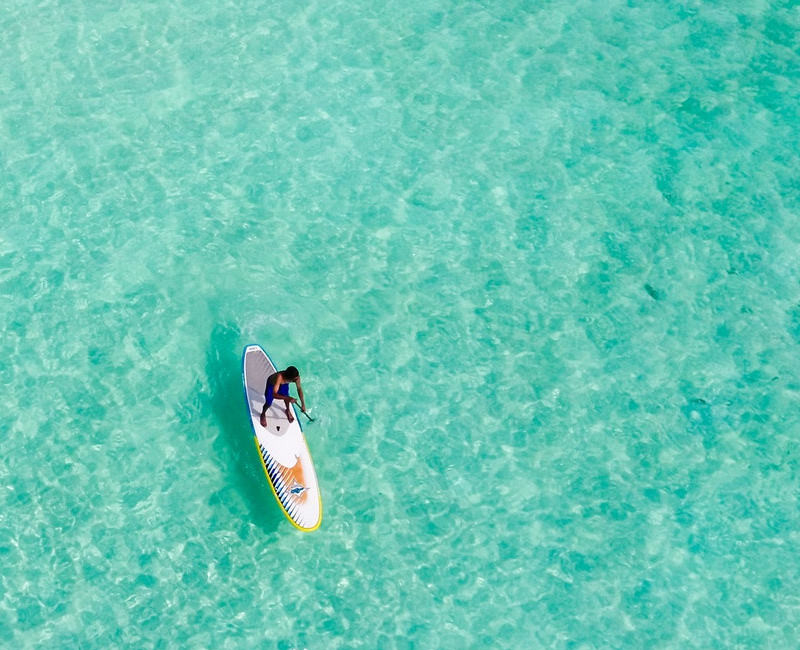 Stand up paddleboarding Maldives