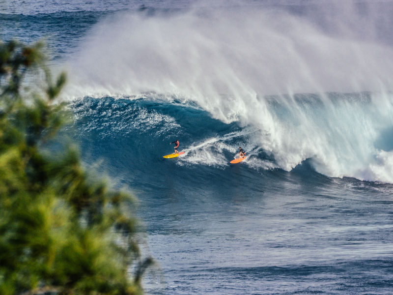 Two Surfers on the waves at Darne Mauritius Surf