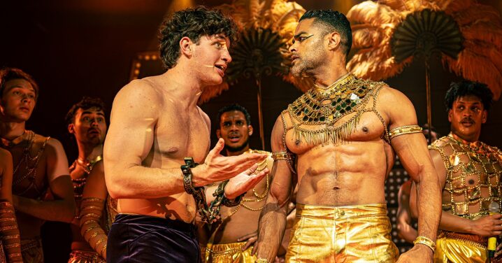 Dylan Janse Van Rensburg (Joseph) on stage with Chris Jaftha (Pharaoh) at Joseph and the technicolour dreamcoat in Johannesburg.