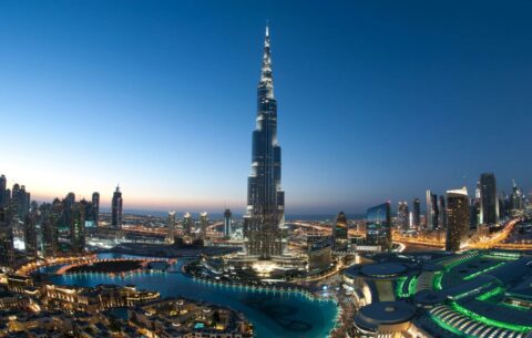 The iconic Dubai skyline during sunset. The Burj Khalifa, the tallest building in the world, stands prominently at the center. The sleek, tapering structure of the Burj Khalifa is illuminated by the setting sun. urrounding the Burj Khalifa are numerous other skyscrapers, each with unique architectural designs and varying heights. This view of the Dubai skyline is a mesmerizing and affordable activity, fitting perfectly with Dubai on a budget: 8 Epic things to do under R1000 and highlighting one of the cheap things to do in Dubai.