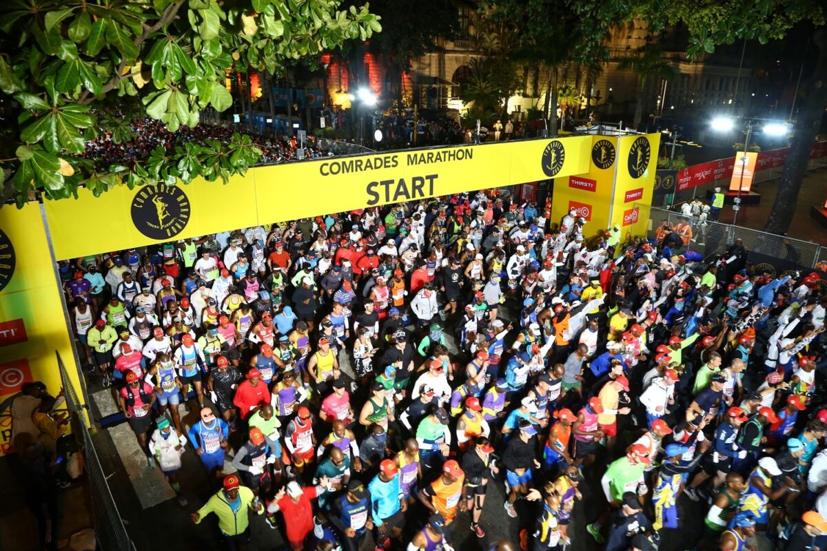 A crowd on marathon runners along Durban's highways during the Comrades Marathon. Here are things to do in Durban during the Comrades marathon 2025