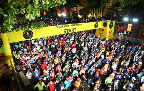 A crowd on marathon runners along Durban's highways during the Comrades Marathon. Here are things to do in Durban during the Comrades marathon 2025