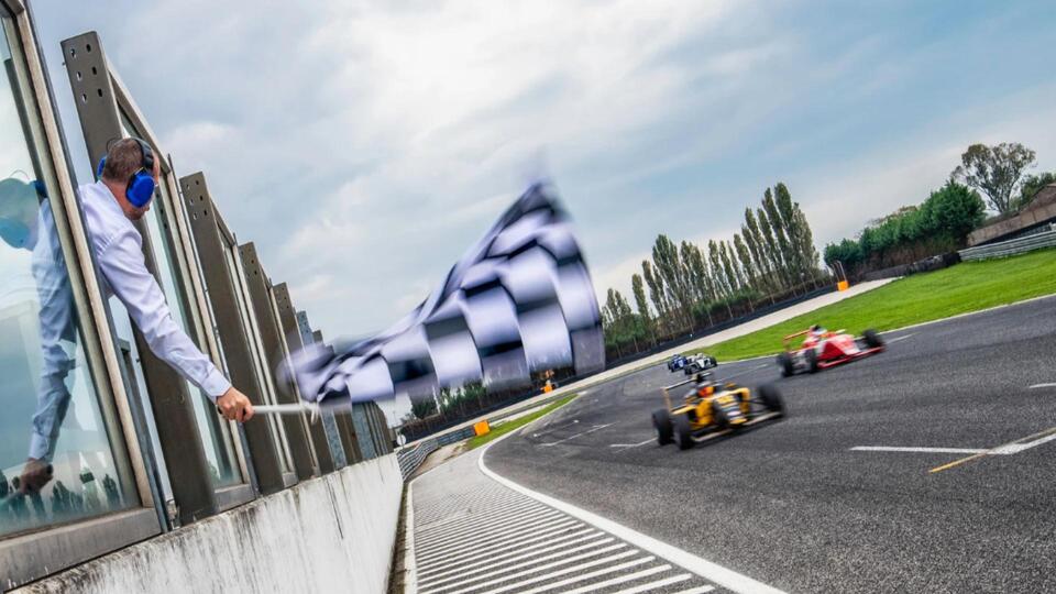 Formula 1 vehicles driving super fast on a race track. F1 in South Africa 2027