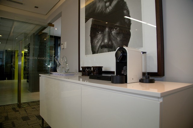 Madiba Room The framed black and white Madiba photo hangs on the boardroom wall as a reminder to all of us of one of the world's greatest leaders, Nelson Mandela.