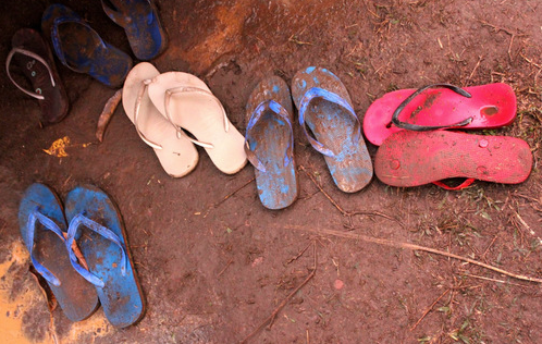 The rain never dampened the spirit and dancing was barefoot in the mud.