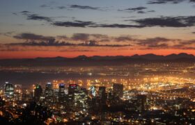 Aerial view of Cape Town at sunset. Feature image for things to do in Cape Town this July.