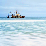 Walvis Bay Skeleton Coast Namibia with dramatic Atlantic Ocean waves and desolate shoreline