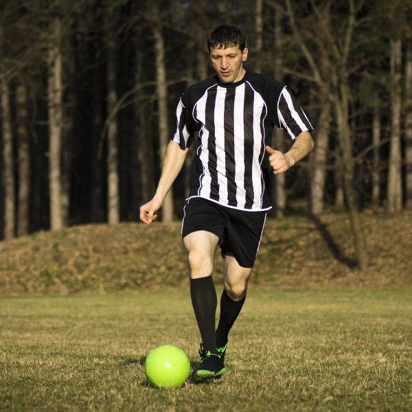 Sétif man kicking soccer ball