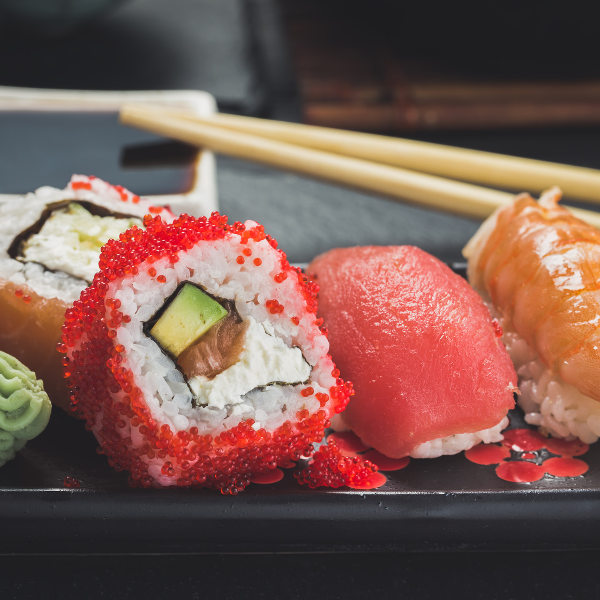 Tokyo Fresh sushi and sashimi platter at a Tokyo Japan restaurant with chopsticks