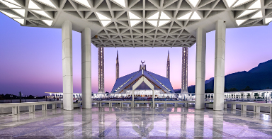 Beautiful view of Shah Faisal Mosque through the pillar. Is is located in Islamabad, capital of Pakistan.